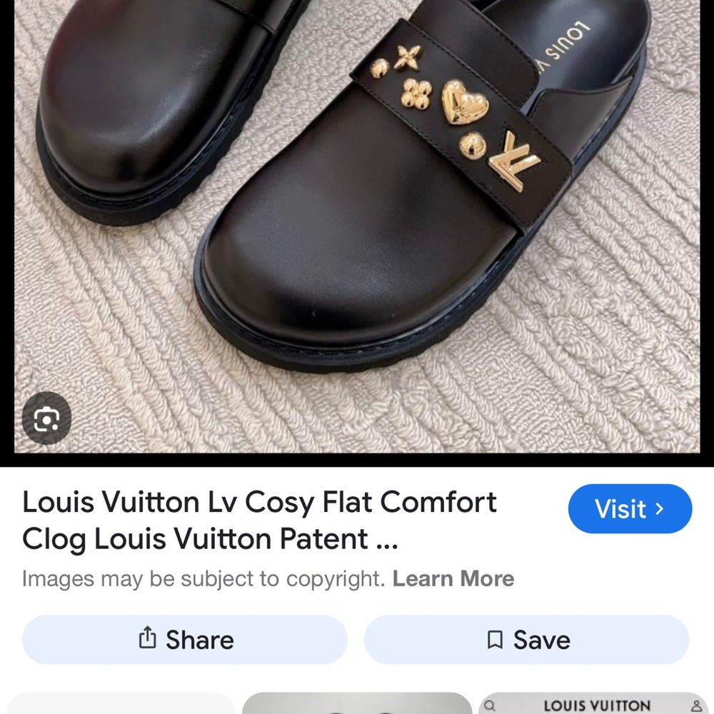 Louis Vuitton Black Mules with Gold Embellishments